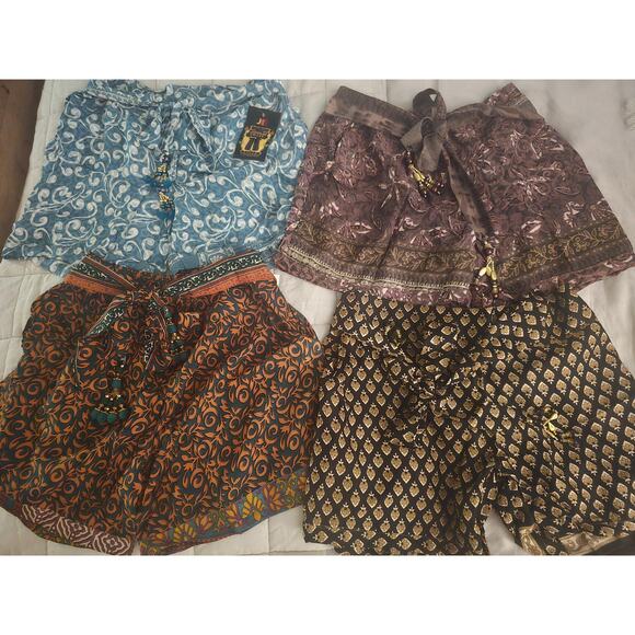 NwT 4 pairs of elastic waist shorts with tassel tie waist Small/Medium - Picture 1 of 5